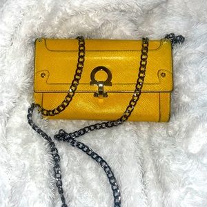 Salvatore Ferragamo mustard yellow long bifold wallet w gun metal silver hardwar